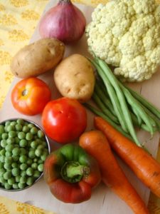 Vegetables - carrots, capsicum, beans, potato, cauliflower, peas, onions, tomatoes
